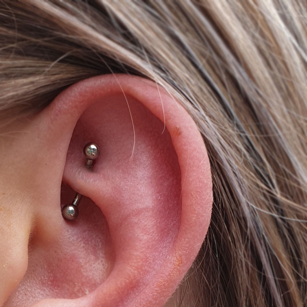 A high polished curved bar in a new rook piercing